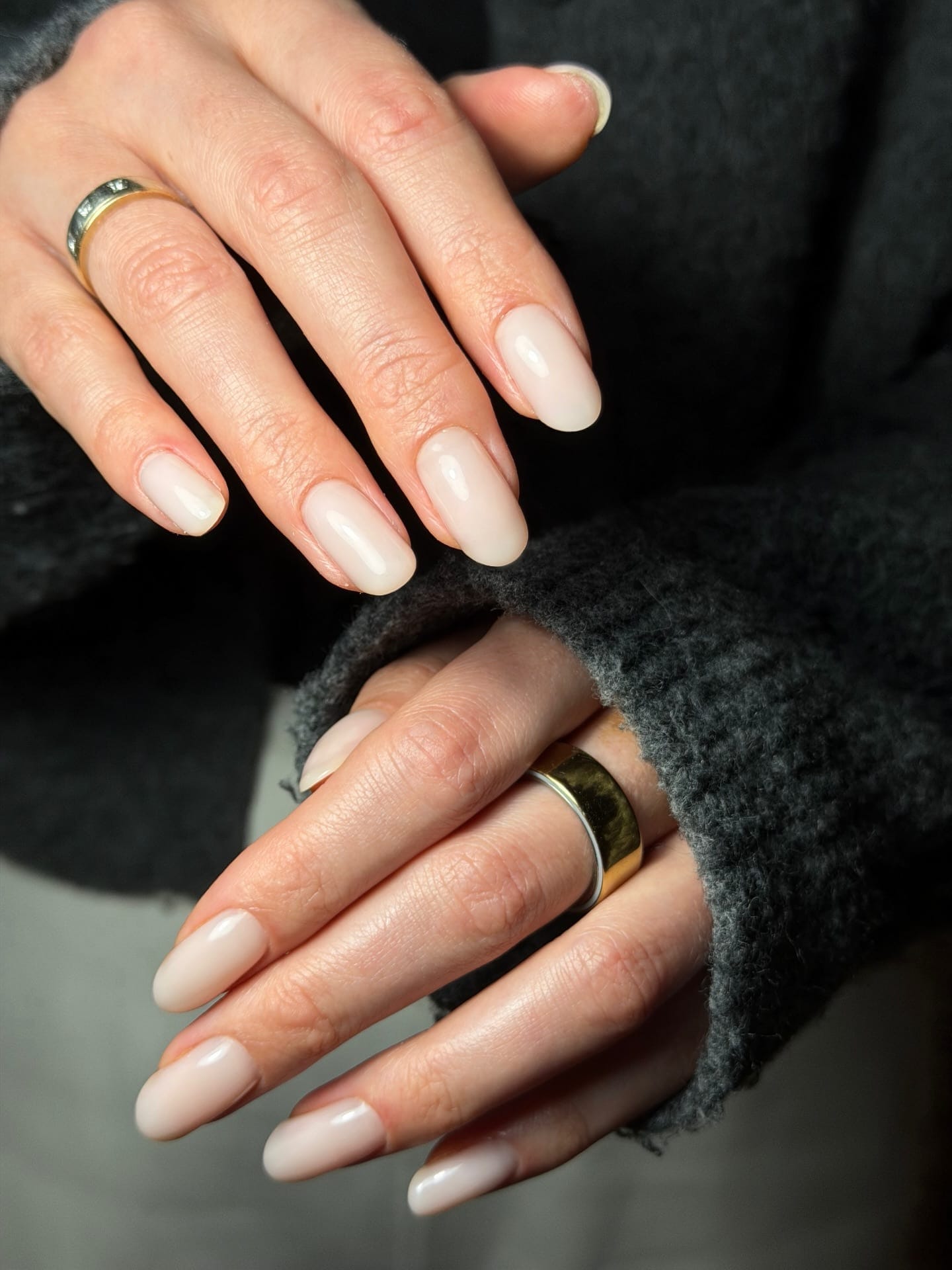 Milky nude glossy gel manicure on medium almond nails